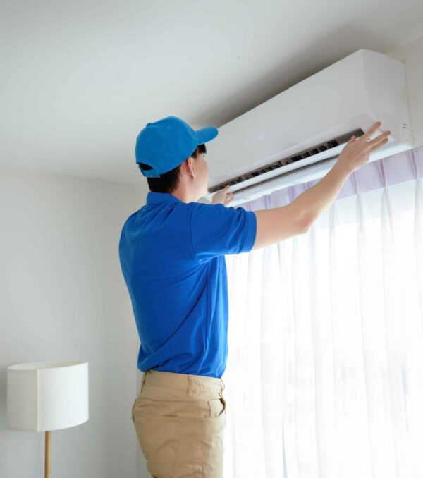 technician-service-man-checking-air-conditioner-2024-12-22-23-18-29-utc_11zon