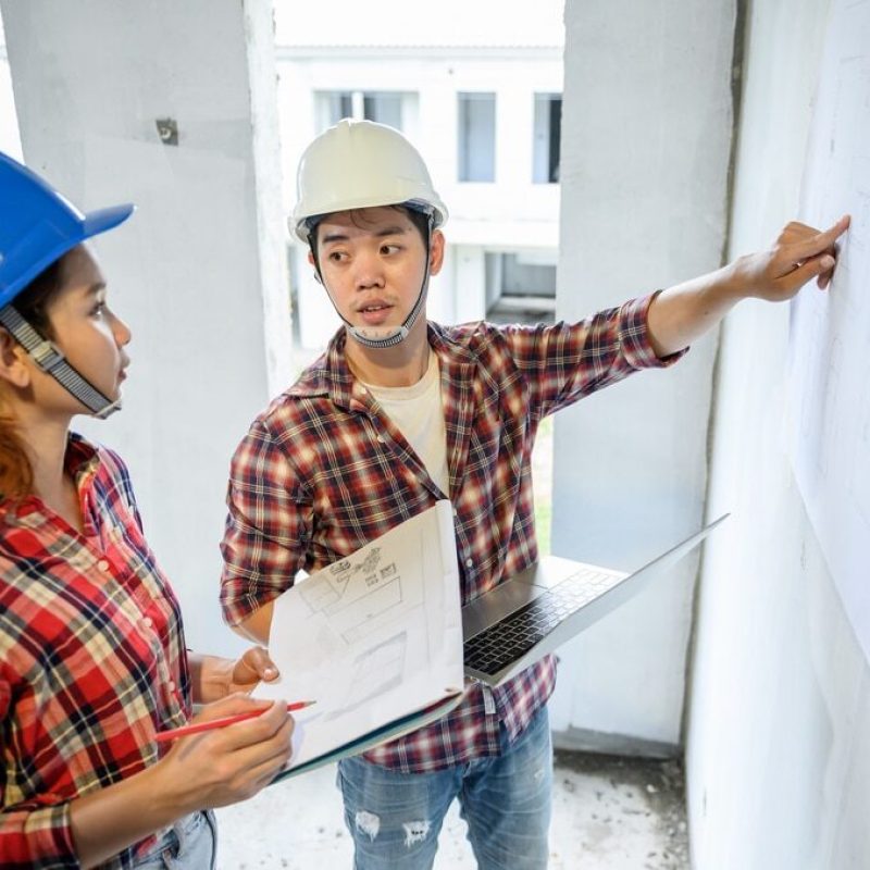 Engineer,Team,Discuss,And,Working,At,Construction,Property,Site.,Inspection